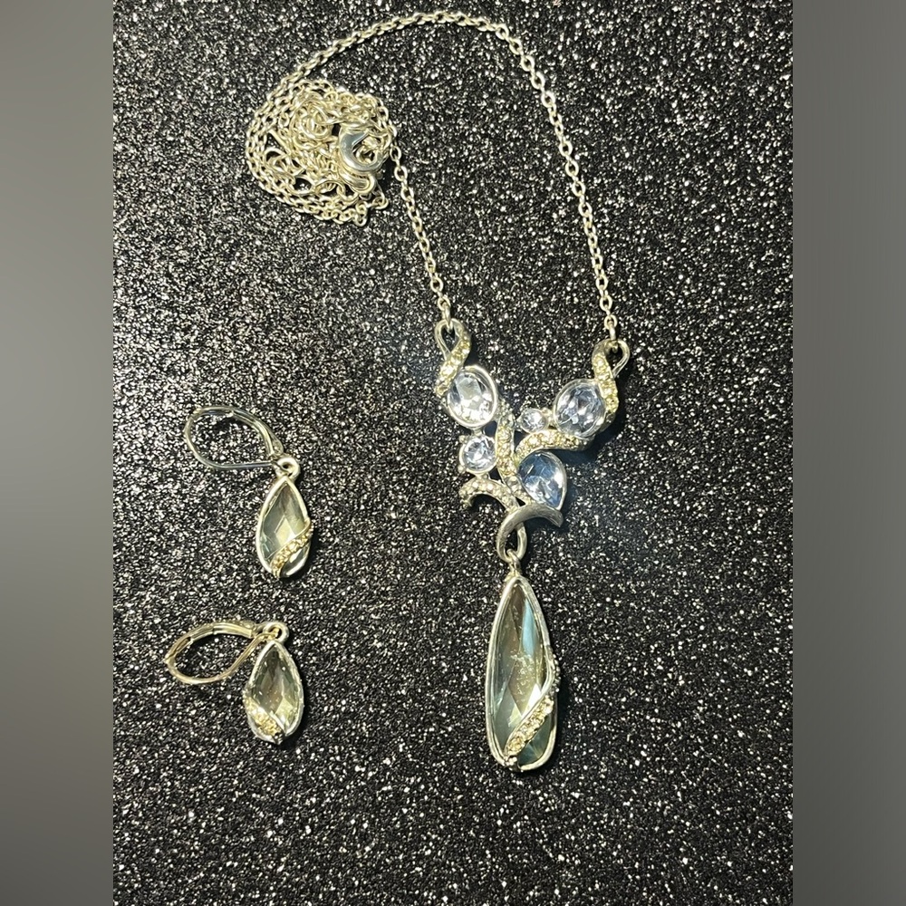 All Wrapped Up" Silvertone Necklace and Earrings